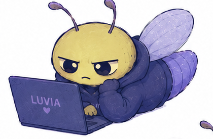 Luvia mascot working on a laptop